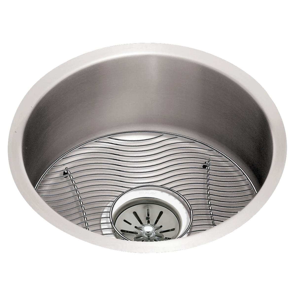 Stainless steel round undermount sink with wave-patterned grid insert and center drain basket.