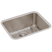 Stainless steel single bowl undermount sink with rounded corners, drain hole, and wire grid insert.