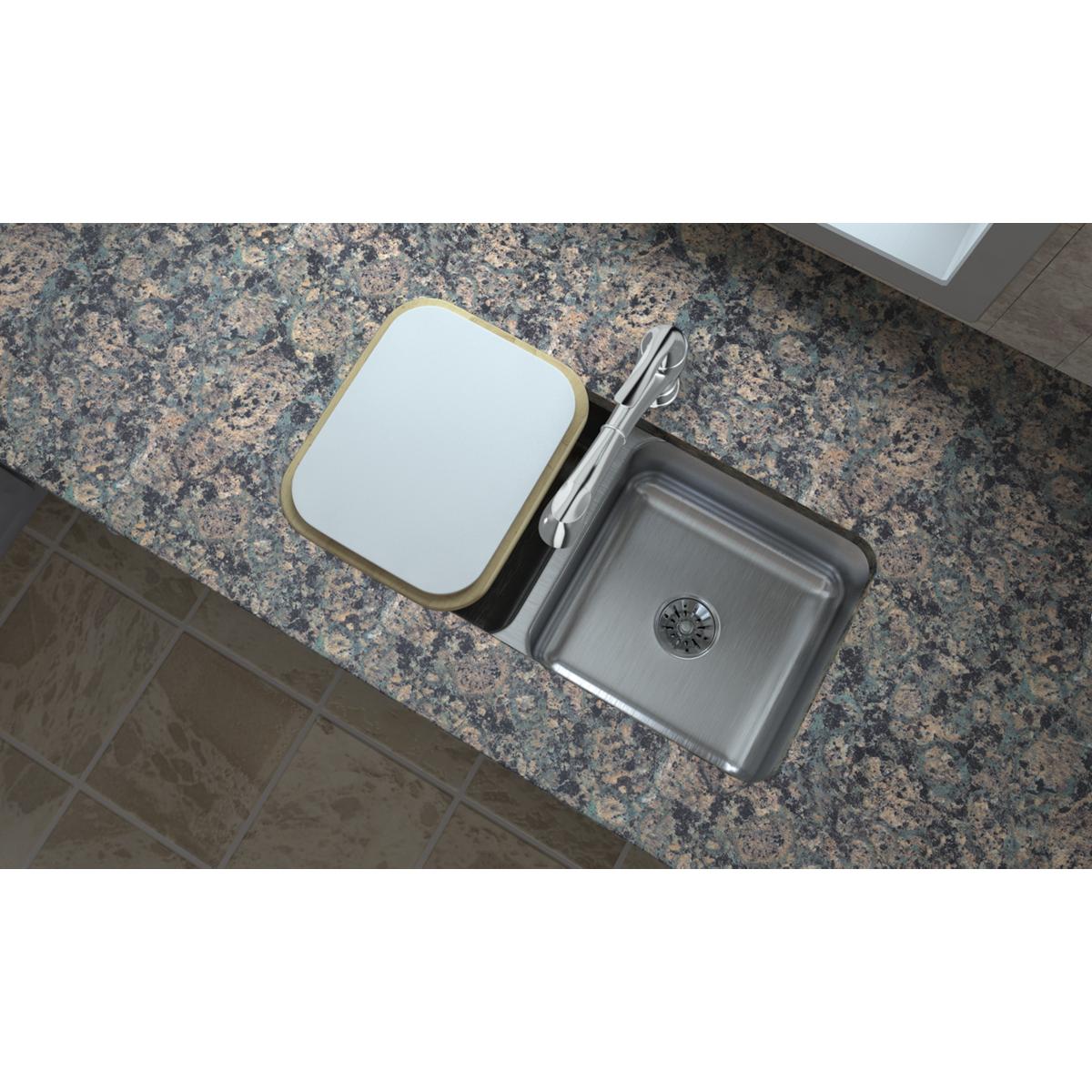 Stainless steel double bowl undermount sink with white cutting board inserted into countertop opening.
