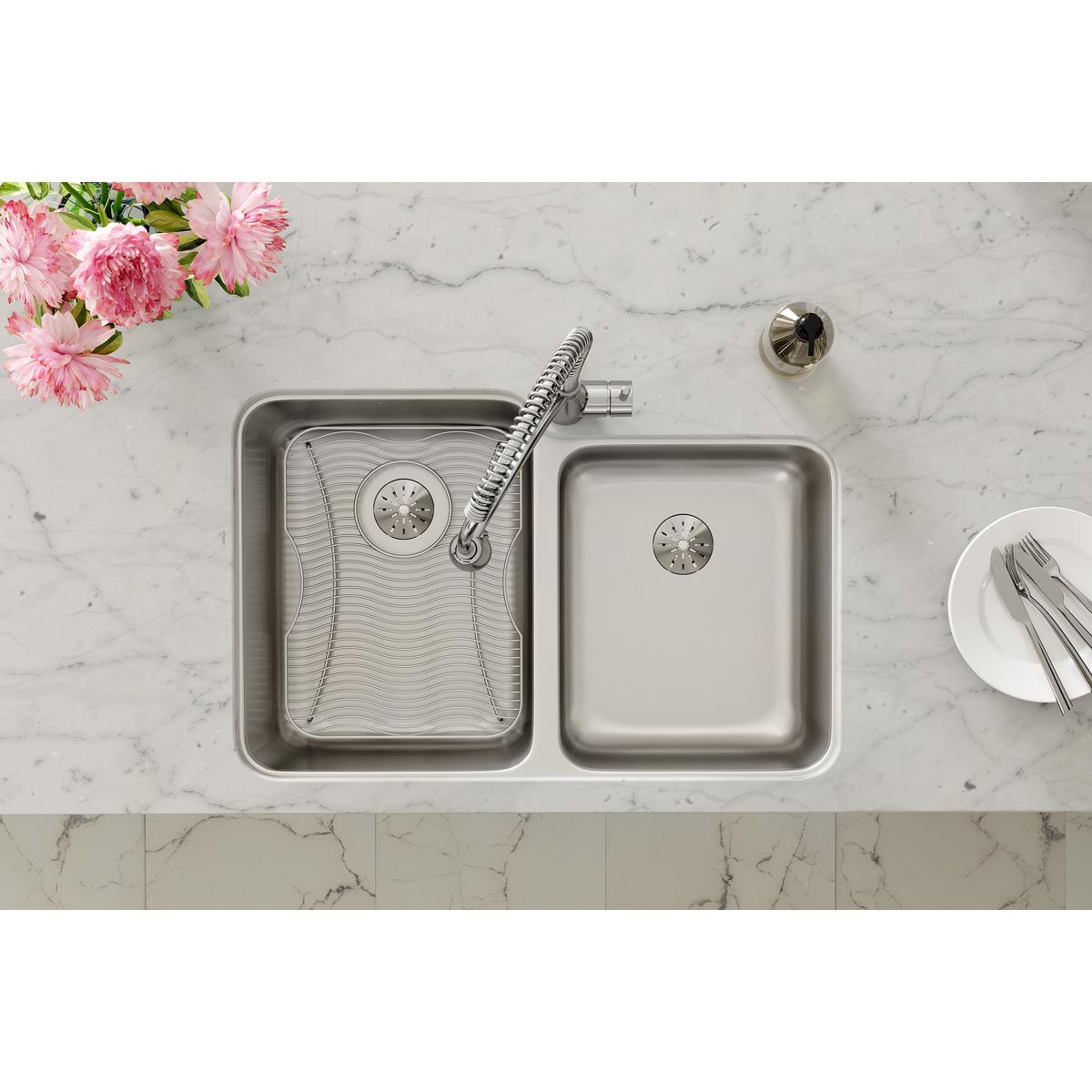 Stainless steel double bowl undermount sink with left bowl featuring drain basket and sprayer arm, right smaller bowl with dr