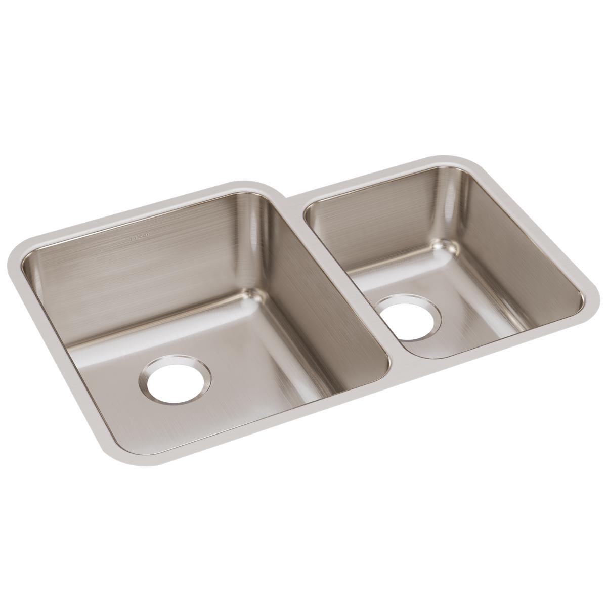 Stainless steel double bowl undermount sink with offset 60/40 configuration and drain holes visible on each bowl.