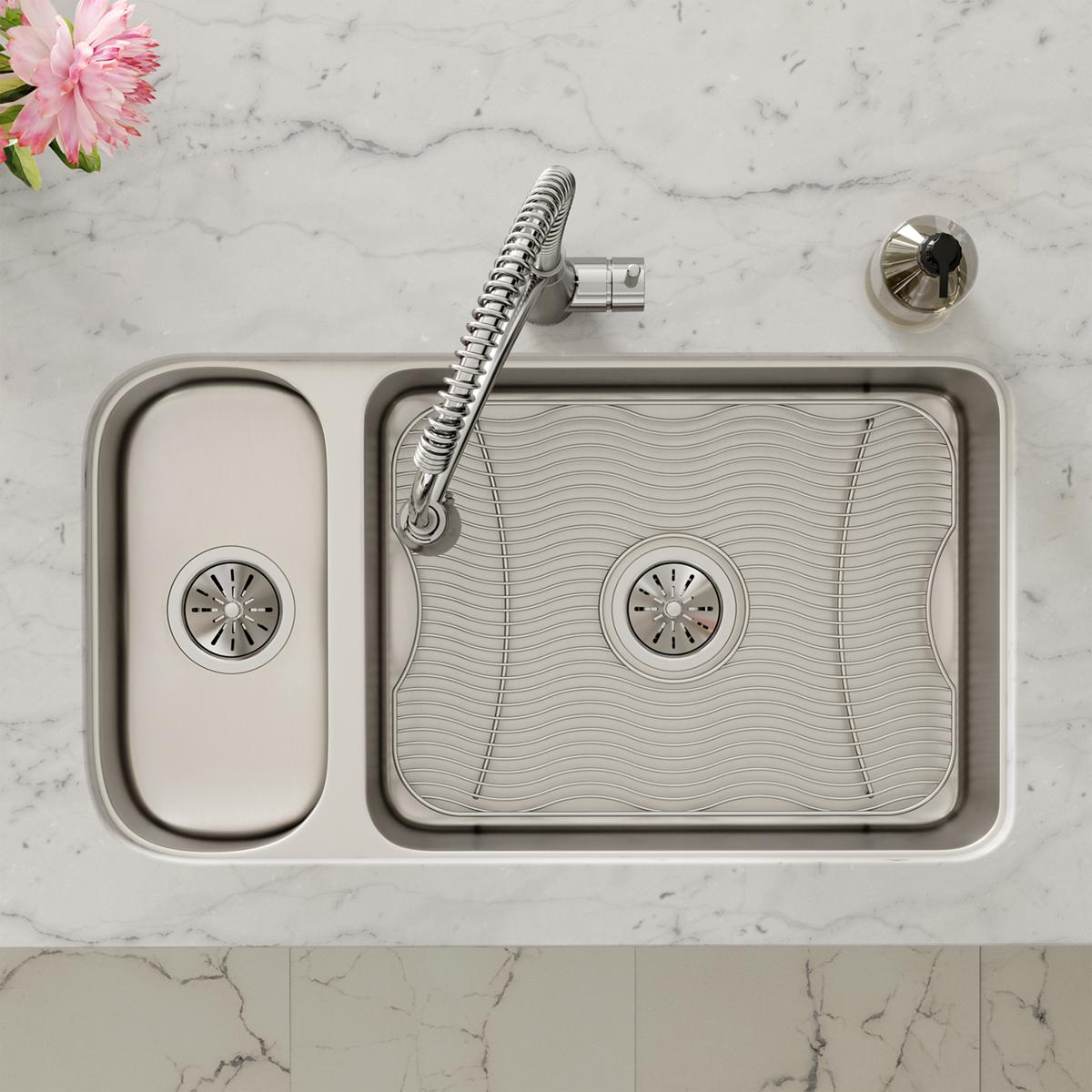 Stainless steel double bowl undermount sink with smaller left bowl, larger right bowl with textured surface, spiral faucet, a