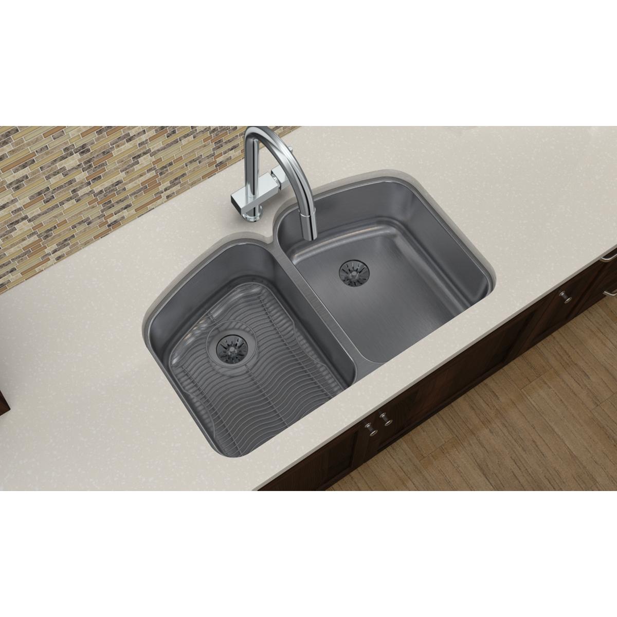 Stainless steel sink grid with parallel ridged pattern for left basin compartment.