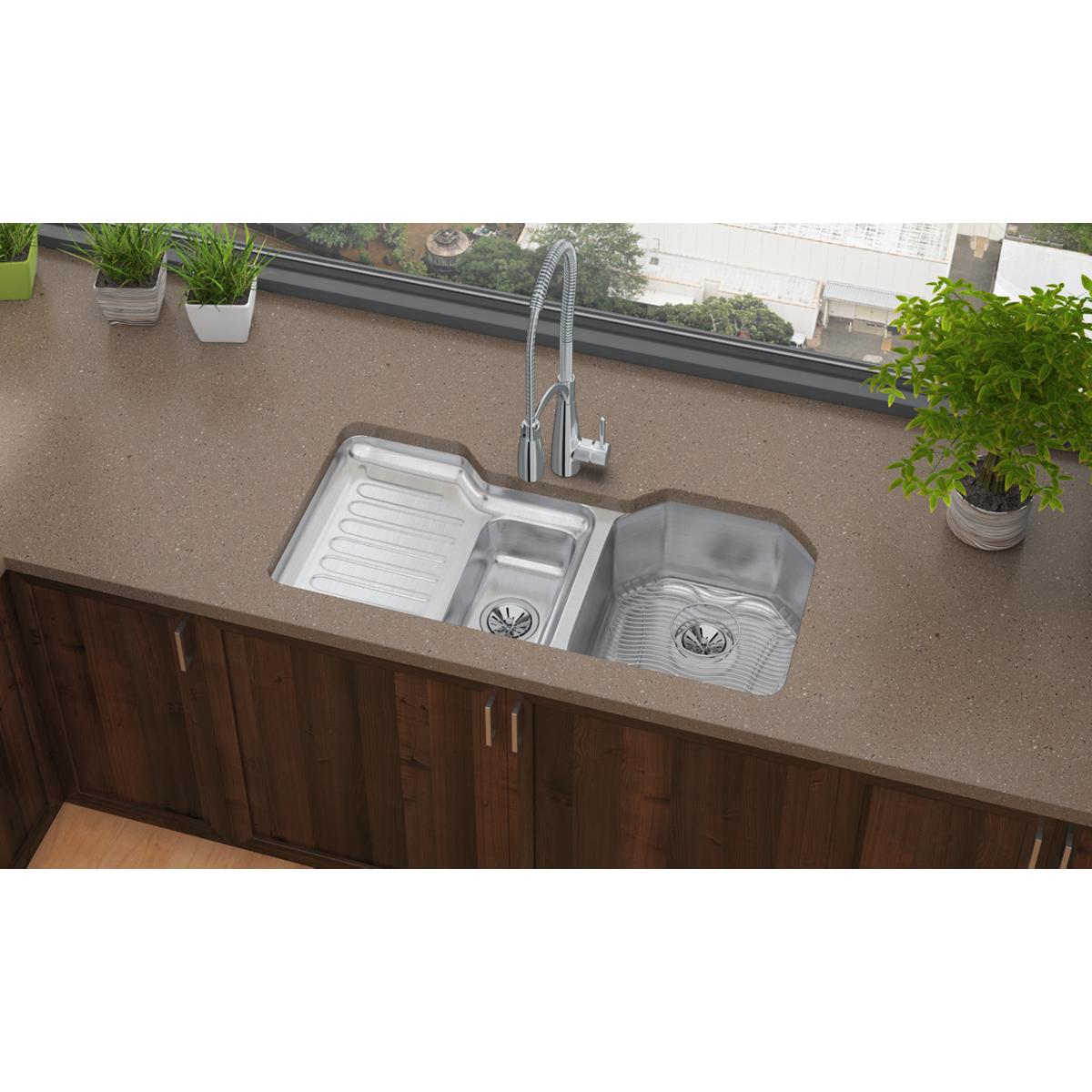 Stainless steel sink grid with horizontal ridged pattern for bottom basin protection.