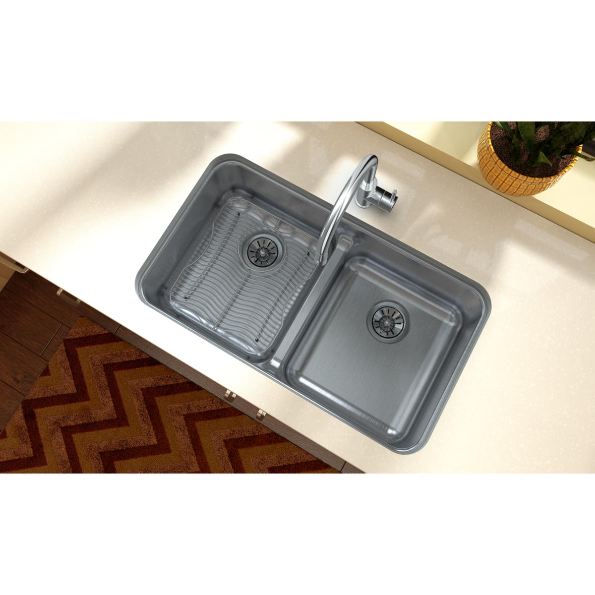Stainless steel sink grid with parallel lines covering the bottom of the left basin compartment.