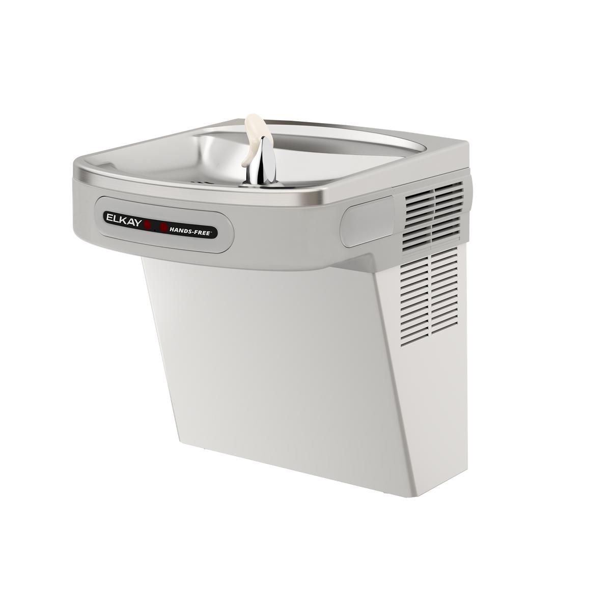 Stainless steel wall-mounted water cooler with hands-free activation and integrated drinking fountain basin.