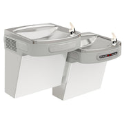Wall-mounted stainless steel water cooler with two drinking fountains at different heights and hands-free activation.