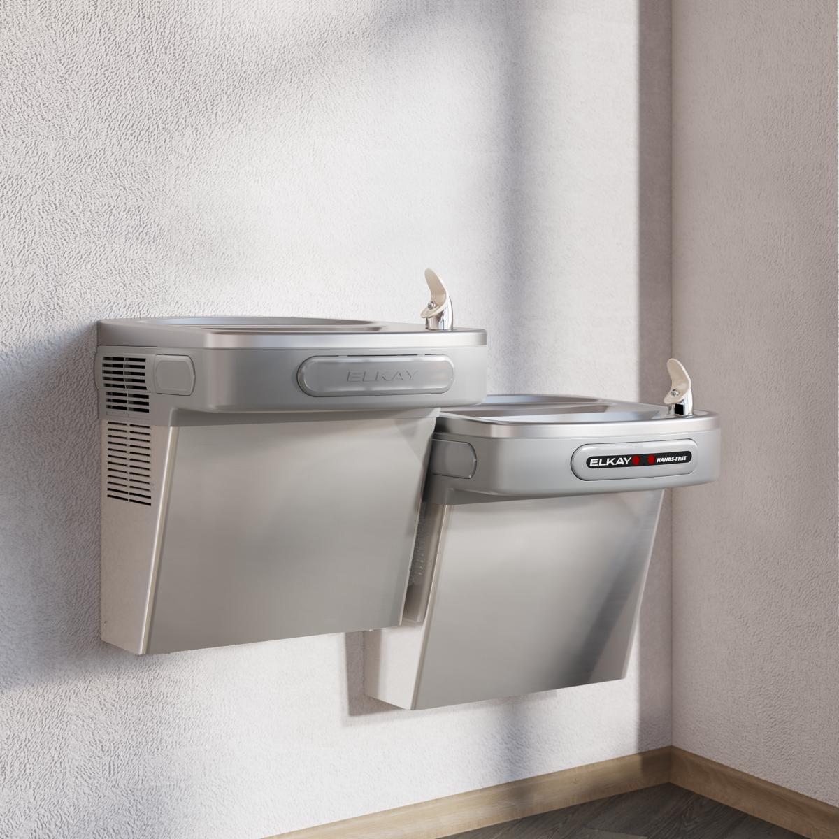 Stainless steel wall-mounted water cooler with two drinking fountains at different heights and sensor activation.
