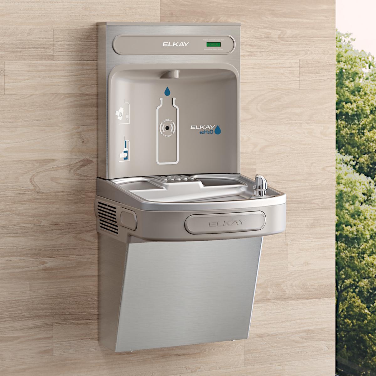 Elkay stainless steel wall-mounted bottle filling station with single drinking fountain and bottle filler spout.