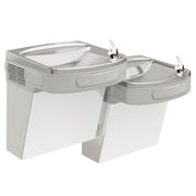 Stainless steel wall-mounted bi-level drinking fountain with two curved basins and drinking spouts at different heights.