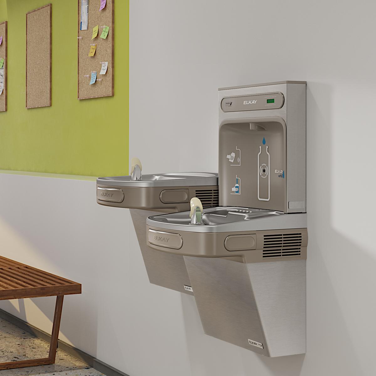 Elkay stainless steel bi-level water cooler and bottle filling station mounted on wall with dual drinking fountains.