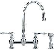 Chrome two-handle bridge faucet with high arc spout and separate side spray attachment.