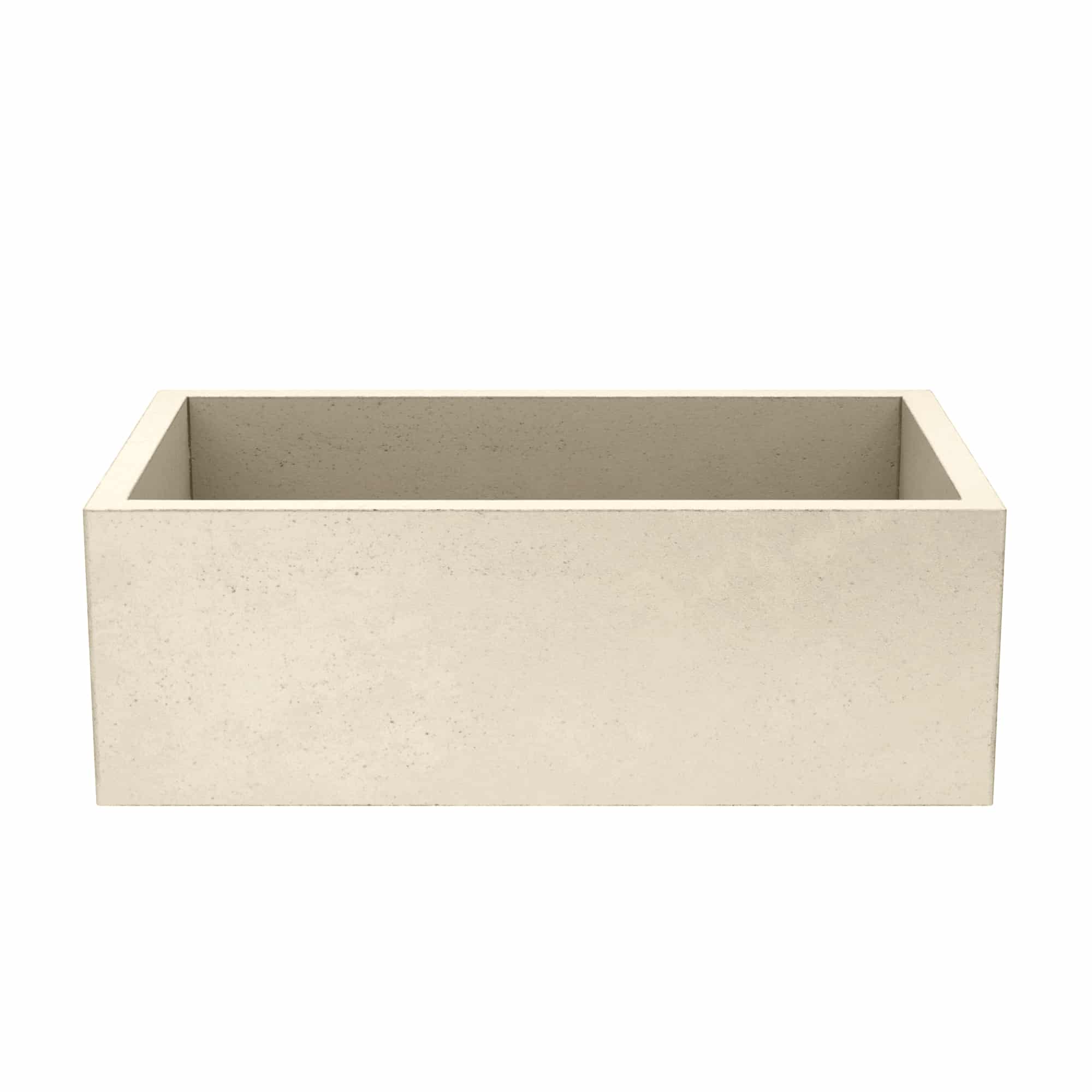 Sand-colored concrete farmhouse sink with rectangular basin and speckled finish.