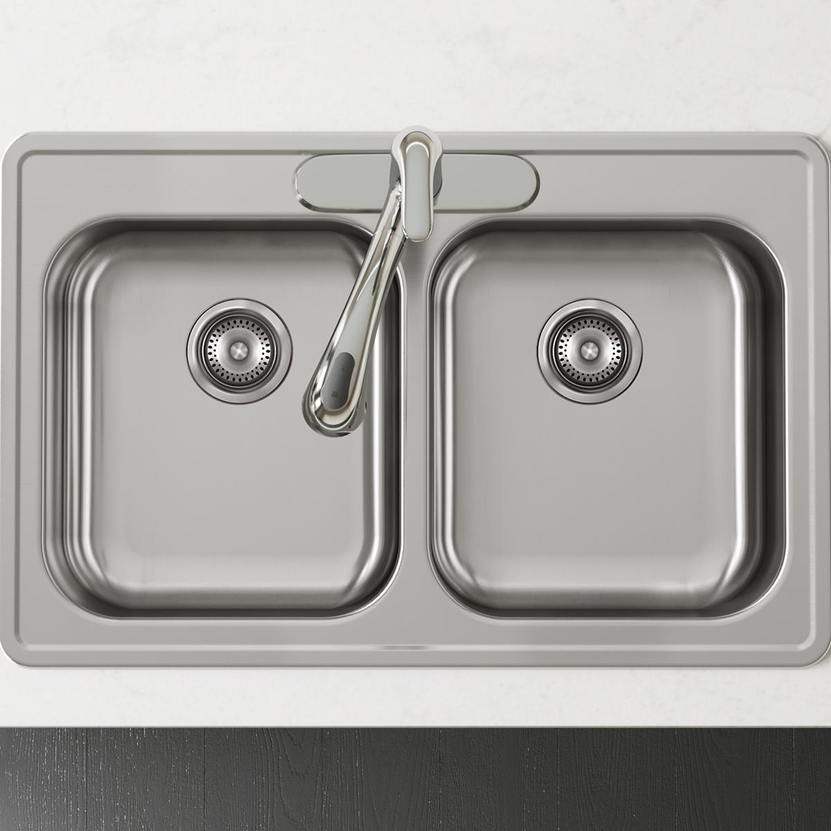 Stainless steel double bowl drop-in sink with two equal-sized bowls, perforated drains, and a chrome faucet mounted on the ri