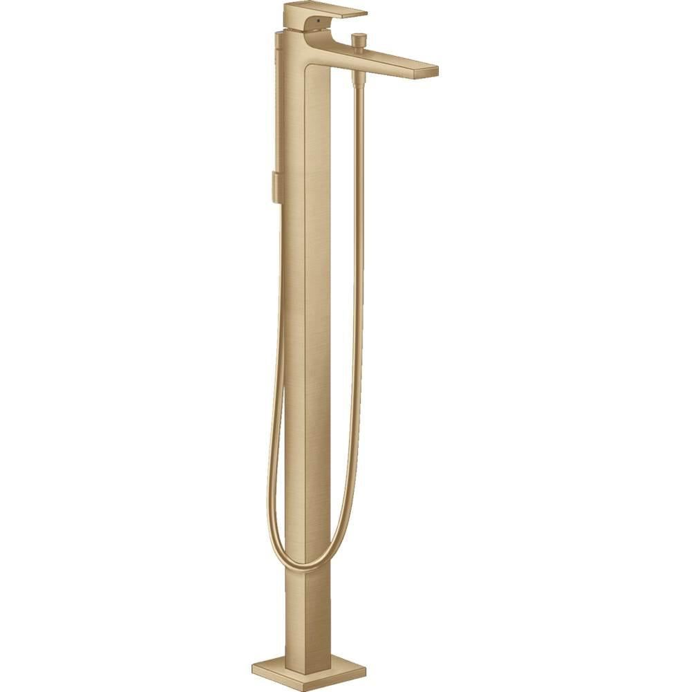 Brushed bronze freestanding tub filler with lever handle, angled spout, and attached handshower hose.
