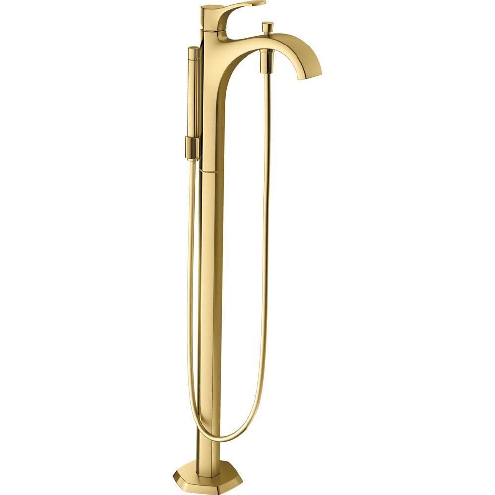 Brushed gold freestanding tub filler with curved spout, single handle, and detachable handshower on hose.