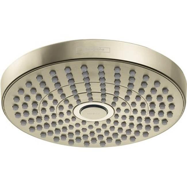 Polished nickel round shower head with multiple spray jets arranged in concentric circles.