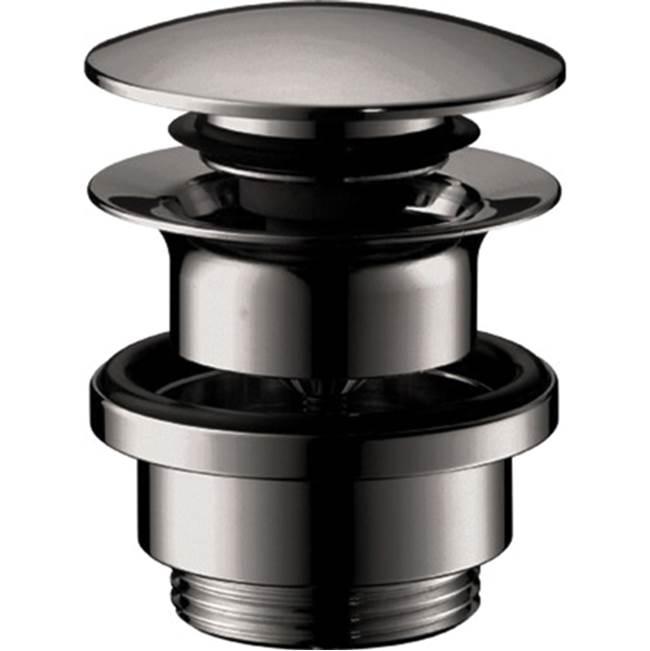Polished black chrome push-open sink drain with flat cap and cylindrical body shown disassembled in layers.