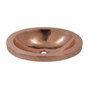 Polished copper oval sink with hammered texture finish and single drain hole.