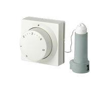 White wall-mounted thermostat dial with numbered settings 1-5 and gray remote sensor bulb connected by capillary tube.