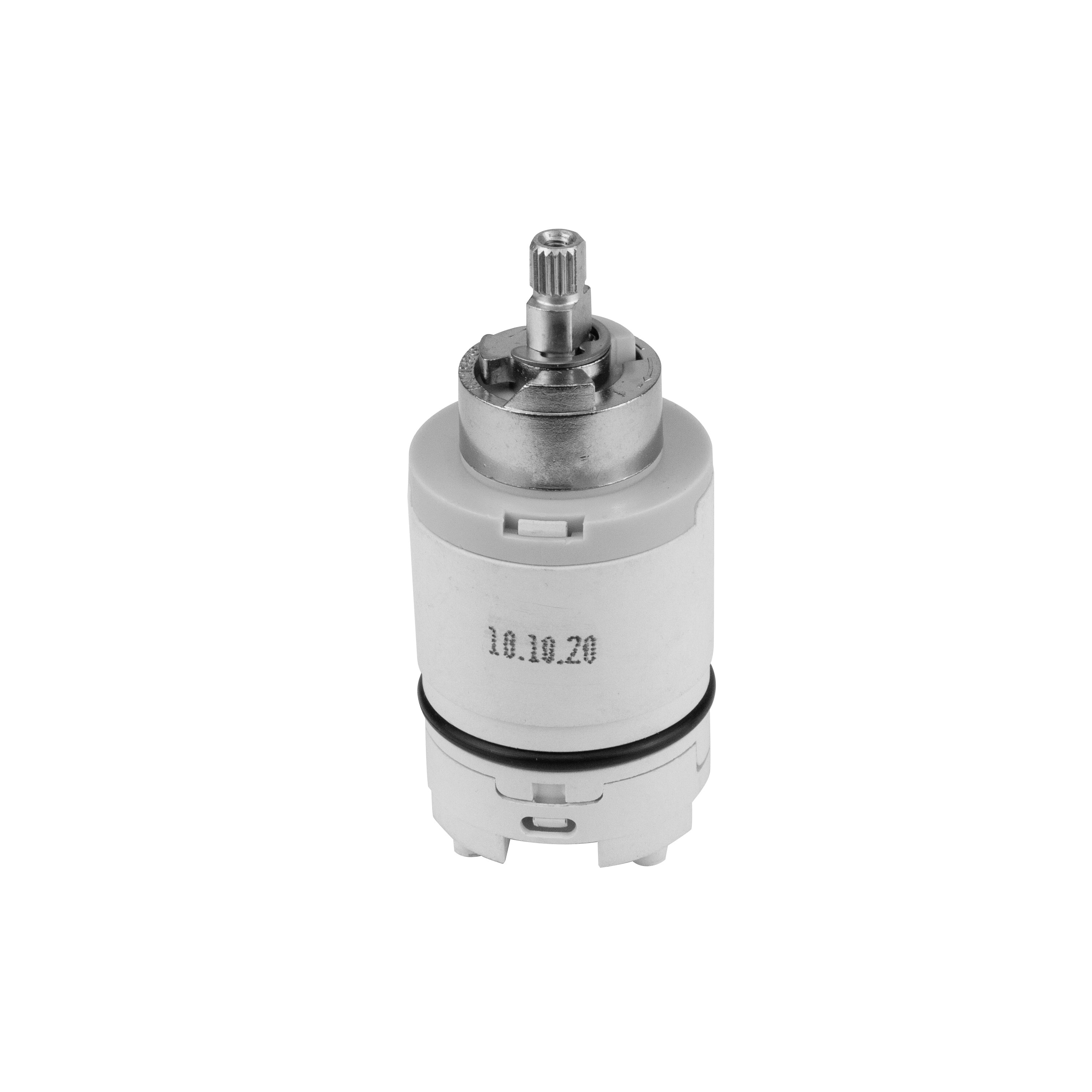 Cylindrical pressure balance valve cartridge with white plastic body, metal top component, and model number printed on side.
