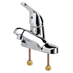 Chrome single-lever kitchen faucet with curved spout and brass supply lines.