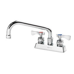 Chrome deck mount faucet with curved spout and two handles on white base.