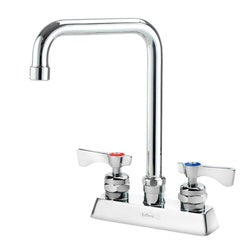 Chrome deck mount faucet with tall double bend spout and two lever handles on white base.
