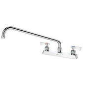 Chrome deck mount faucet with two handles, 16-inch curved spout, and sprayer attachment.