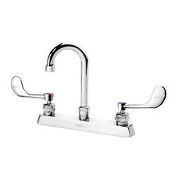 Chrome deck-mount faucet with curved gooseneck spout and two wristblade handles on white base.