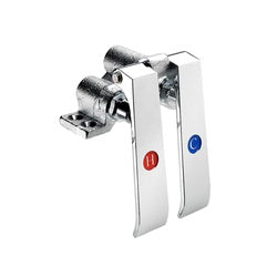 Chrome knee pedal valve with dual red and blue foot pedals mounted on white rectangular base.
