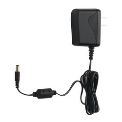 Black AC adapter with coiled power cord and small connector plug for electronic faucet.