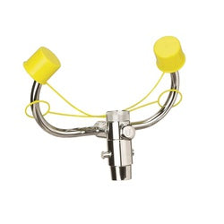 Chrome eye wash faucet with dual yellow spray heads and foot pedal activation.
