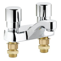 Chrome lavatory faucet with dual handles and brass connection ports, self-closing metering design.
