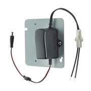 Black box mount transformer with attached power cable and wire connectors on gray mounting plate.