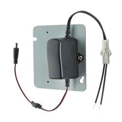 Black box mount transformer with attached power cable and wire connectors on gray mounting plate.
