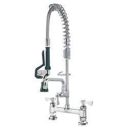 Chrome deck mount pre-rinse faucet with coiled spray head and single lever control.