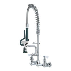 Stainless steel wall-mounted pre-rinse faucet with coiled spray hose, black handle, and 6-inch spout.