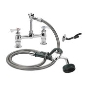 Chrome deck mount utility spray faucet with dual handles, curved spout, hose, and foot pedal control.