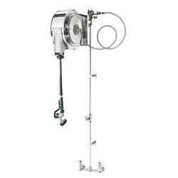 Stainless steel enclosed hose reel assembly with center-mounted faucet and coiled hose attached to wall bracket.