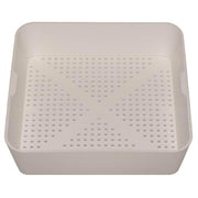 White plastic square kitchen floor drain strainer with perforated surface and raised edges.