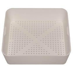 White plastic square kitchen floor drain strainer with perforated surface and raised edges.