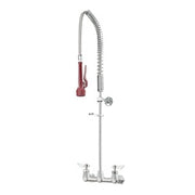 Wall-mounted pre-rinse faucet with coiled spray hose, red handle, and dual base knobs on white background.