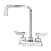 Chrome deck mount faucet with double bend spout and two wing handles on white base.