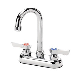Chrome kitchen faucet with dual handles, curved spout, and deck-mounted base.