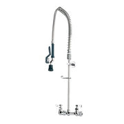 Chrome wall-mounted pre-rinse kitchen faucet with coiled hose and spray head.