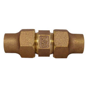 Bronze pipe coupling with flared ends and hexagonal center nut featuring manufacturer markings.