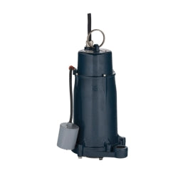 Dark blue cylindrical grinder pump with float switch and power cord attached.