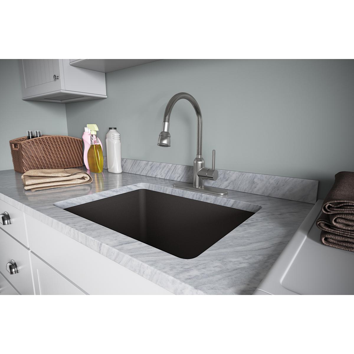 Lustrous steel utility faucet with flexible spout and single lever handle mounted above black rectangular sink.