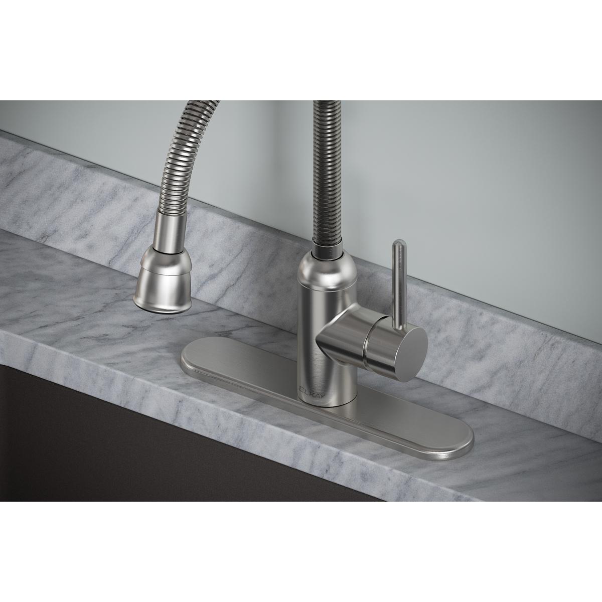 Lustrous steel laundry faucet with flexible spout and forward-only lever handle mounted on marble countertop.